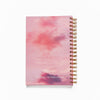 Pink spiral bound meditation journal that says remember the magic is in you